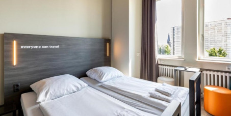 9450 din za noćenje sa doručkom za dvoje odraslih u standardnoj 1/2 sobi + dvoje dece u hotelu A&O Aachen Hauptbahnhof!
